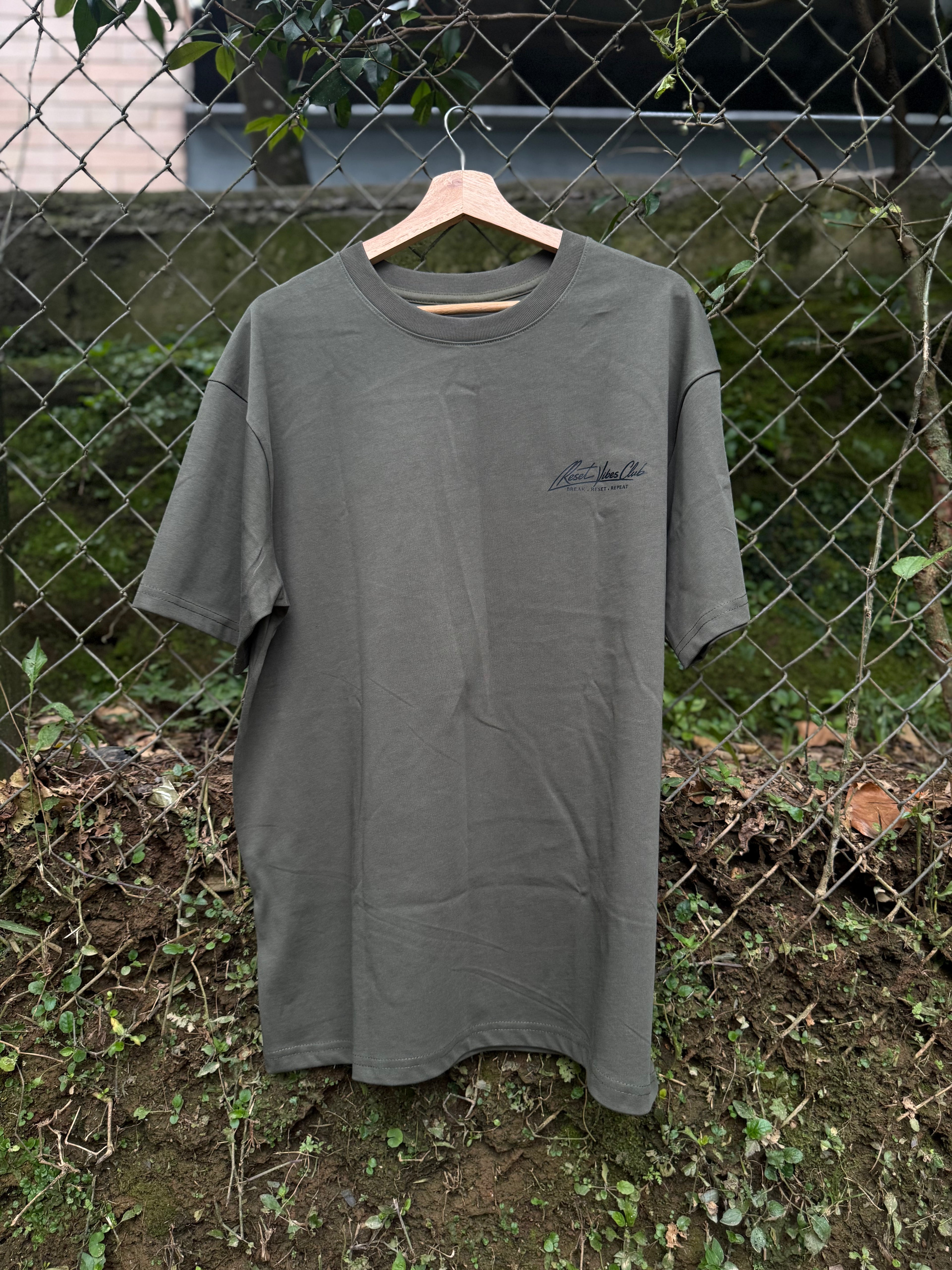 CAMISETA SEMI OVERSIZED MASCULINA DOLLAR VERDE OLIVO